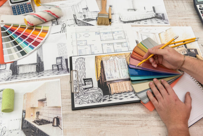 The,Designer,Chooses,The,Perfect,Color,For,A,New,Apartment. Hire an interior decorator